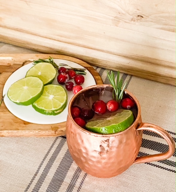 moscow mule with cranberries and limes