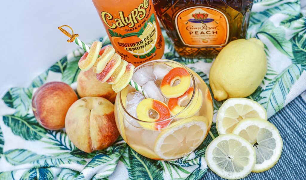 overhead view of crown royal peach whiskey fish bowl recipe