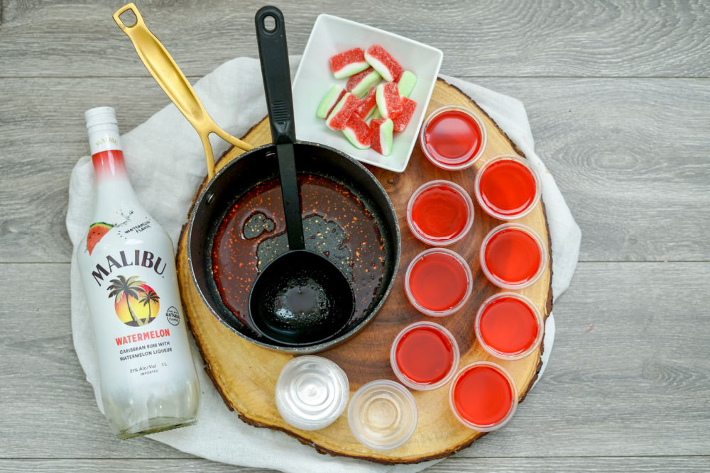 adding jello to pan for shots