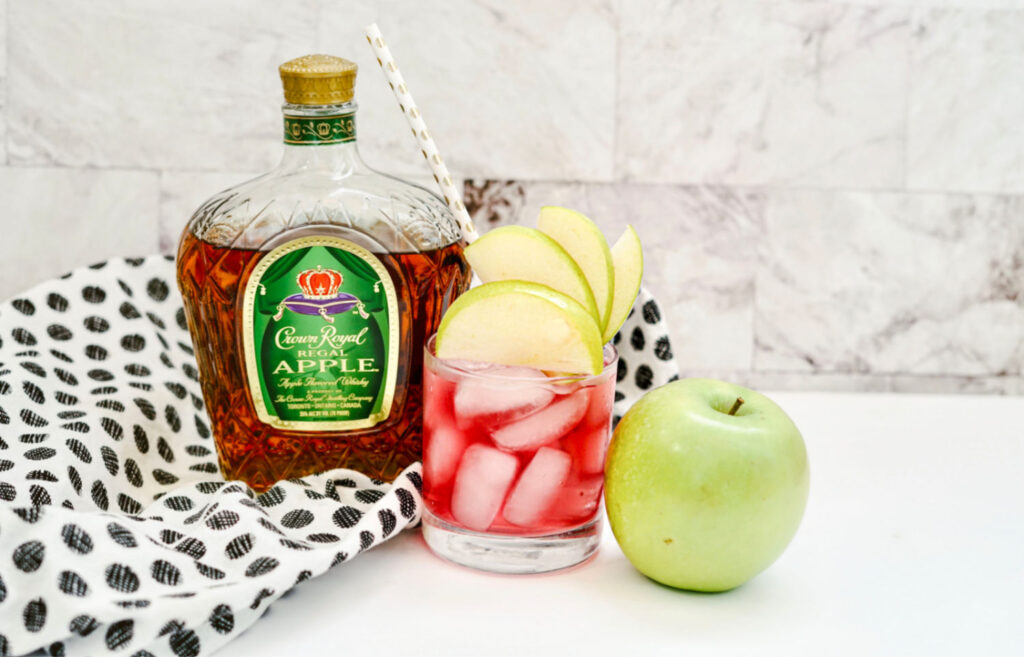 crown royal cranapple on counter with green apples